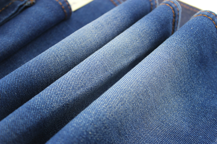 牛仔服装为什么贵贵在水洗工艺